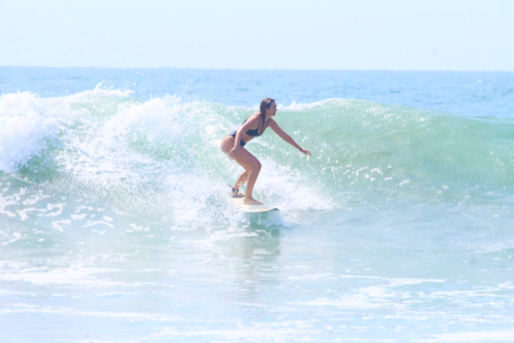 Riley surfing