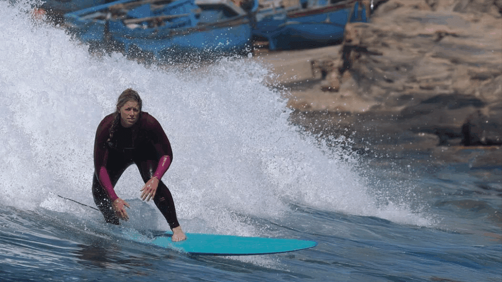 Natasha surfing