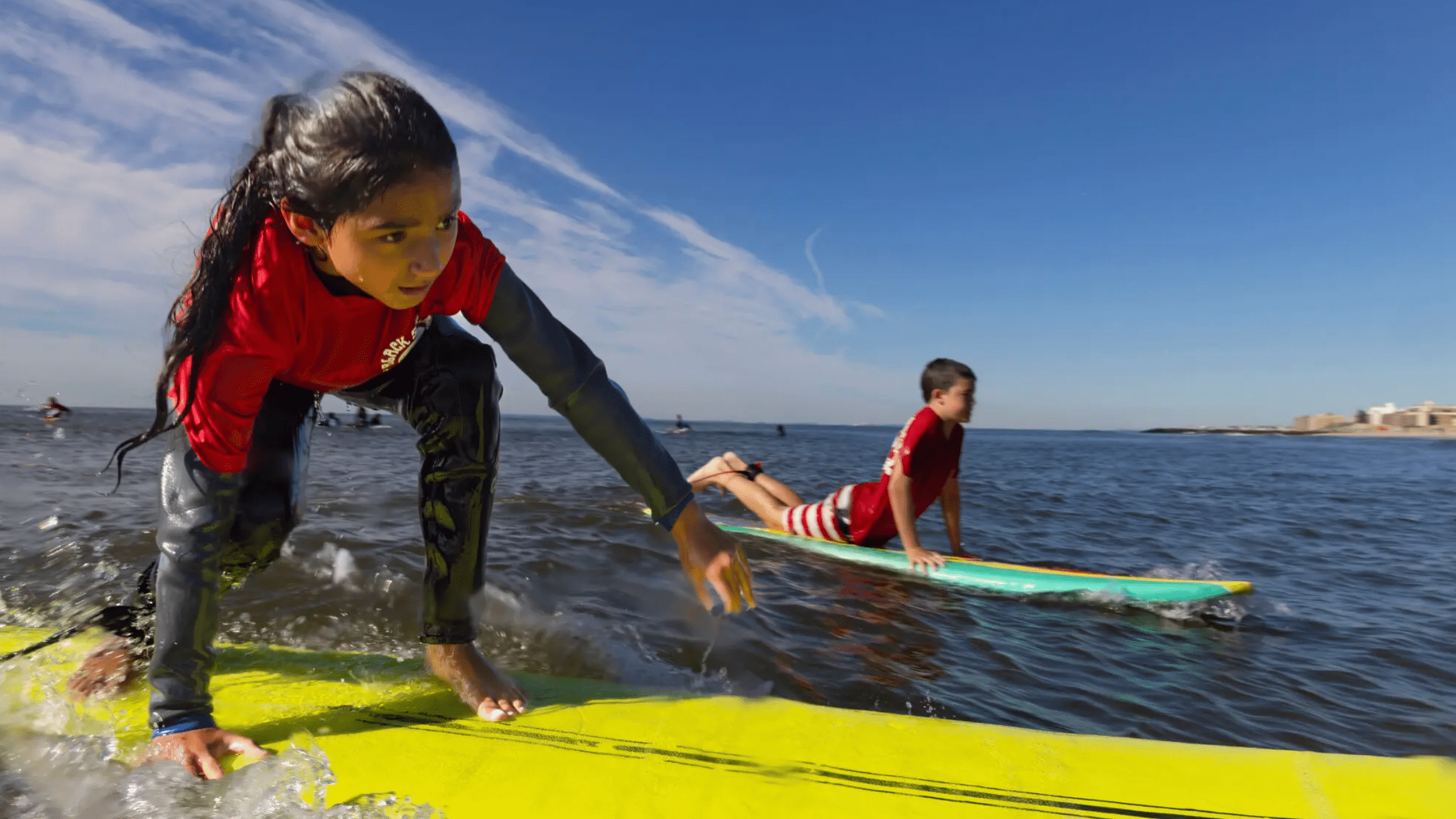 London gets waves. Hawaiian highschoolers get championships. Young New Yorkers get the gift of surf. Surfing vet gets a new tooth.
