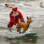 Santas surf, shark bites, Texas lagoons, EOS archives, and Point Breaks